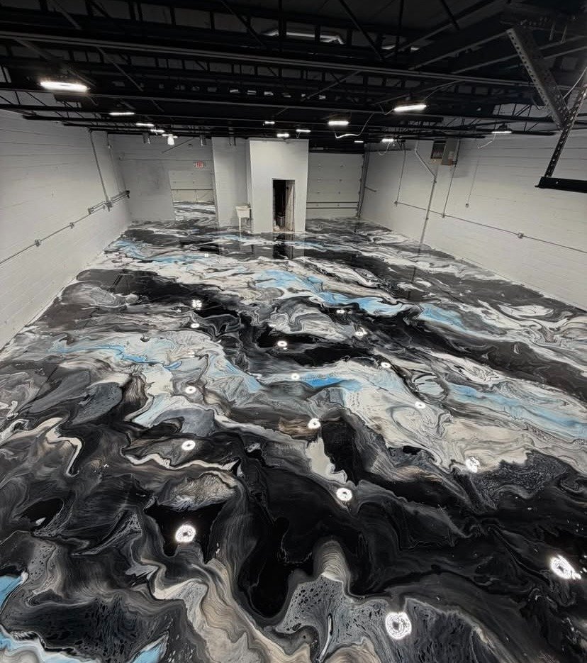 Black and blue metallic resin commercial floor
